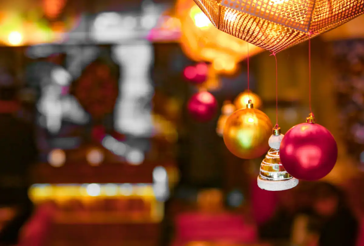 A joyful celebration of the holiday season, featuring festive decorations and acts of kindness, symbolizing the lessons of empathy and gratitude for children during festivals.